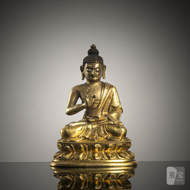 A PART-GILT BRONZE FIGURE OF BUDDHA SHAKYAMUNI
